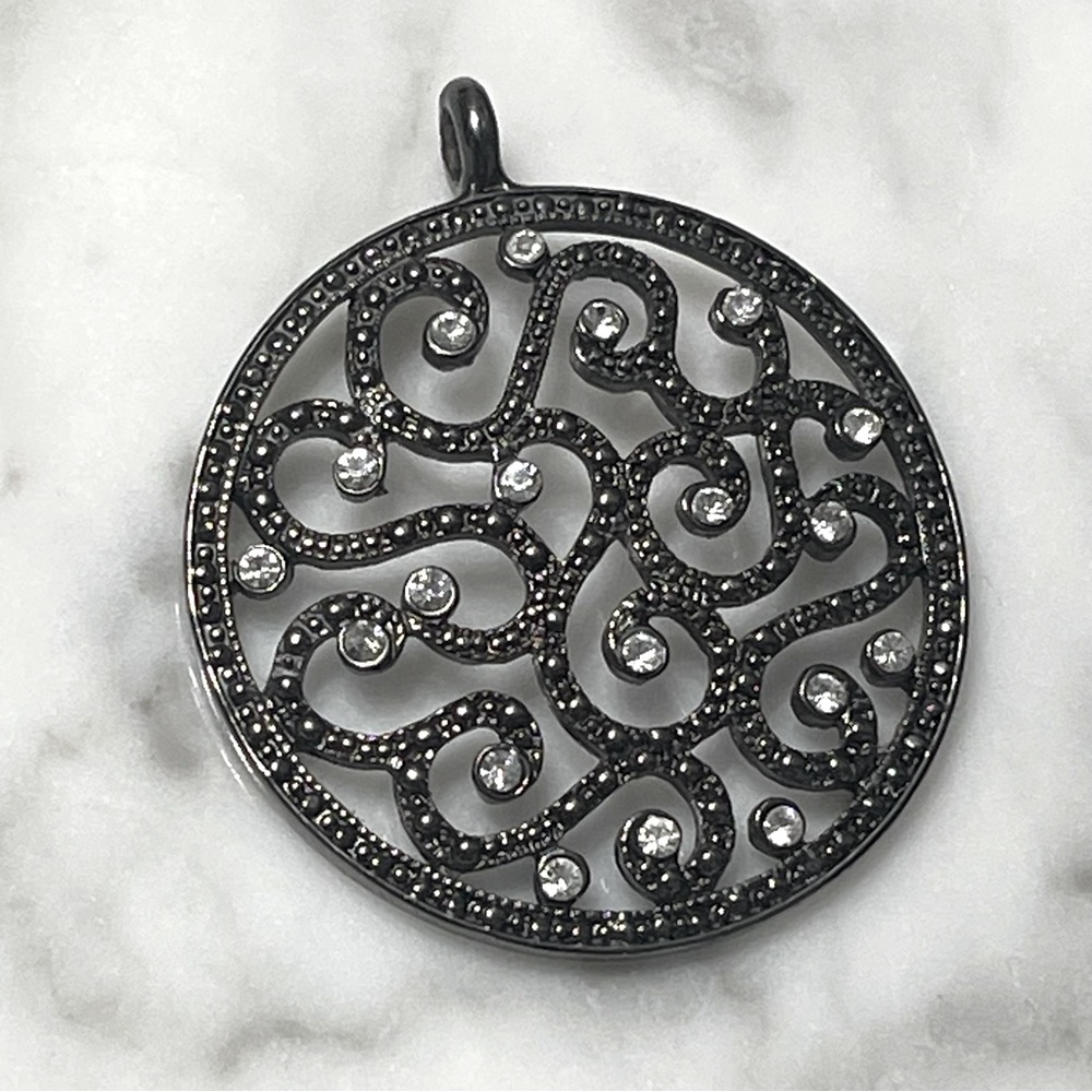 Black filigree pendant with rhinestones
